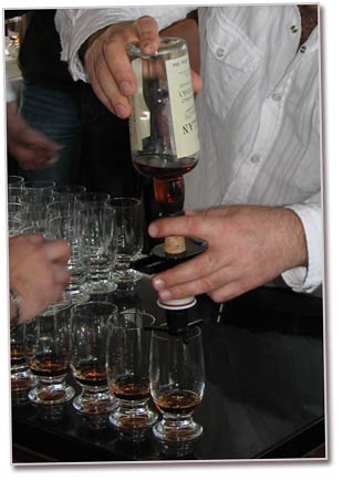 pouring  whisky glasses